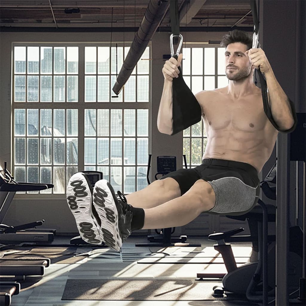 Uomo che usa la Pura Neve CoreLift Bar per esercizi a corpo libero in palestra.