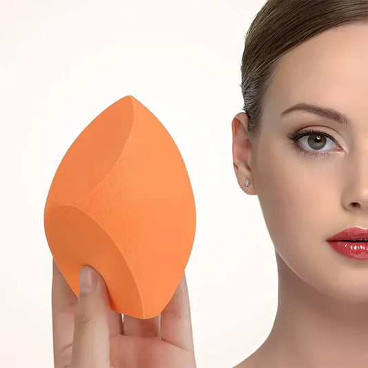 Pura Neve – Frullatore Portatile, spugna per trucco color arancione, promessa di applicazione impecabile.