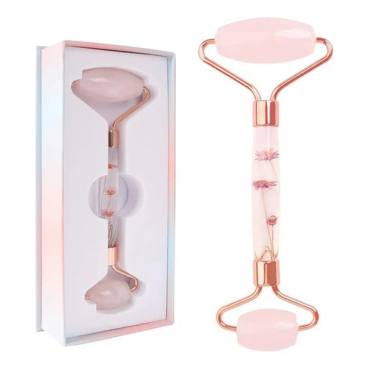 Pura Neve – Rullo Massaggiante per Viso e Corpo con packaging elegante e dettagli fioriti.